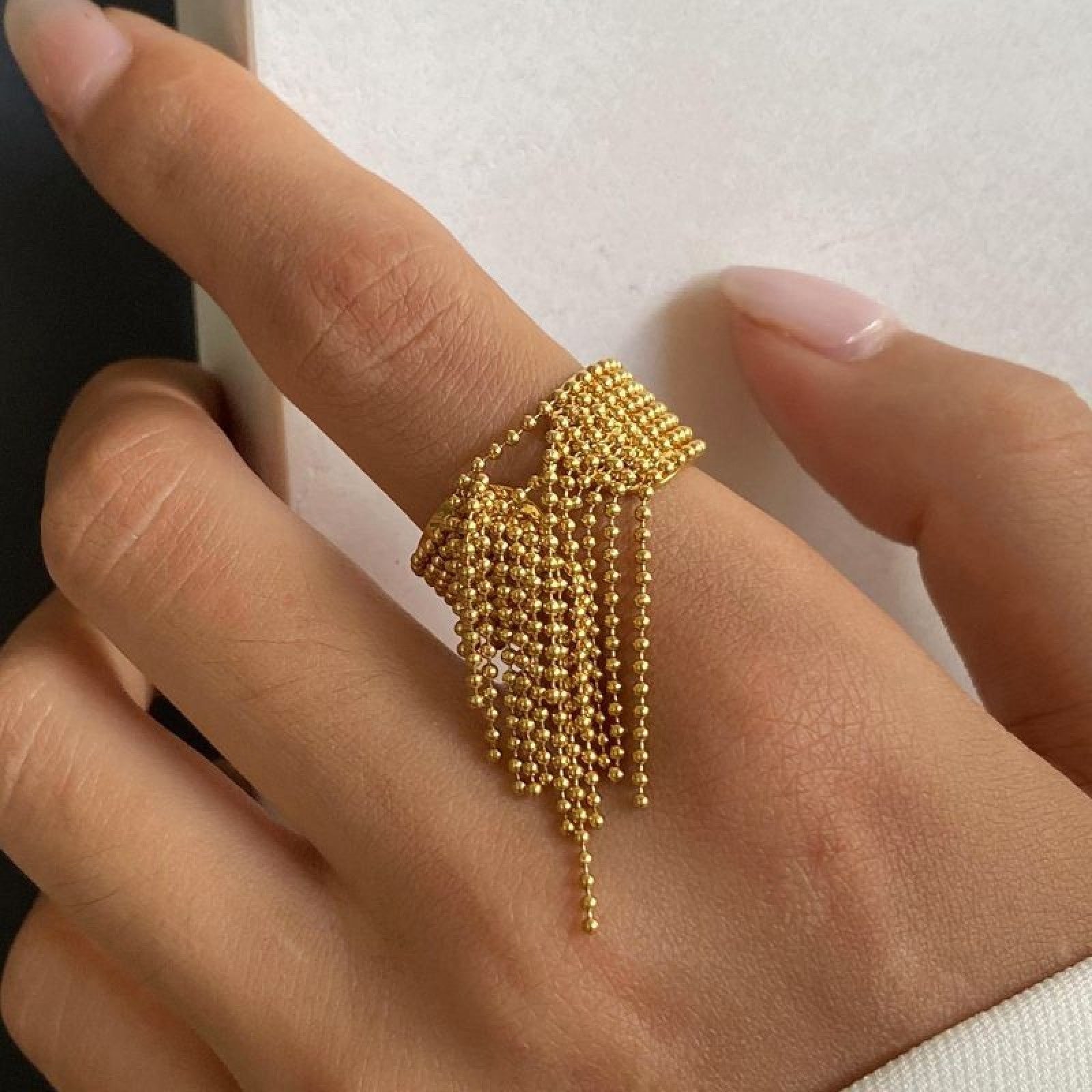 Anello acciaio inox regolabile con fili pendenti