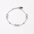 Bracciale acciaio inox con infinito e punti luce