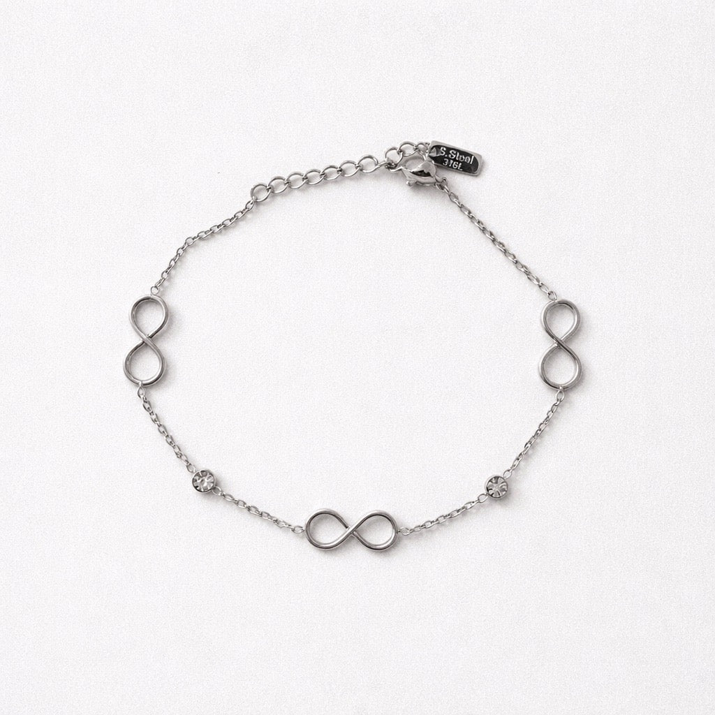 Bracciale acciaio inox con infinito e punti luce