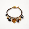 Bracciale cordino e acciaio inox con charms