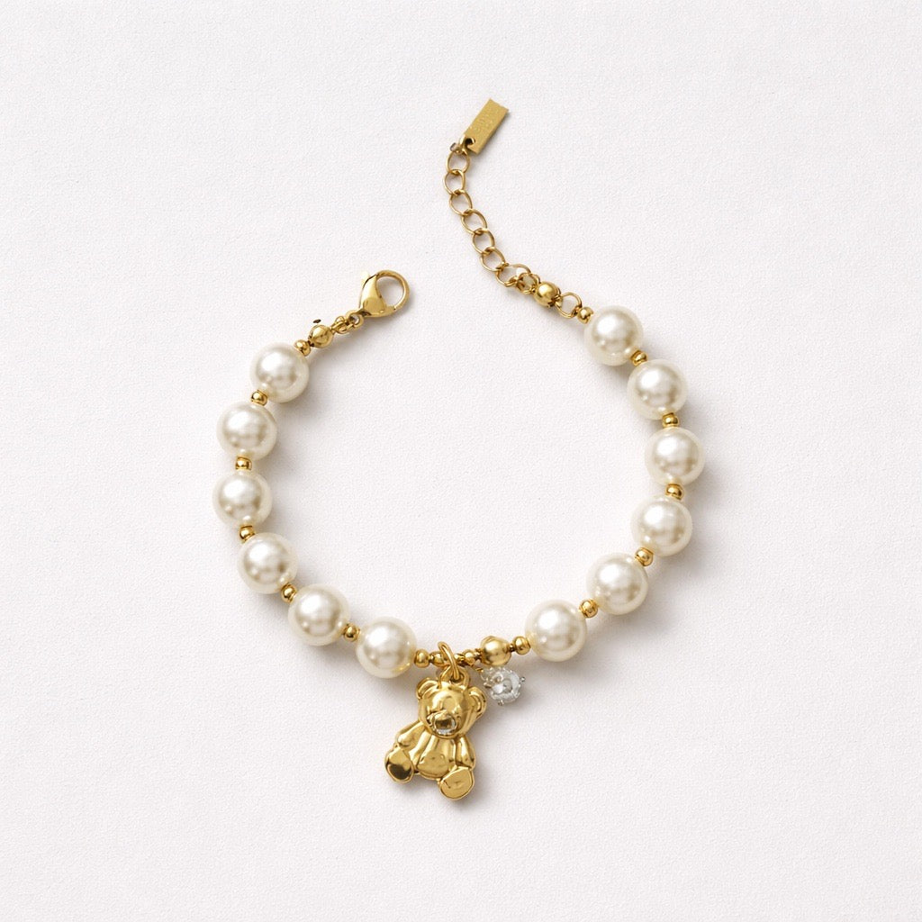 Bracciale acciaio inox perle e orsetto pendente