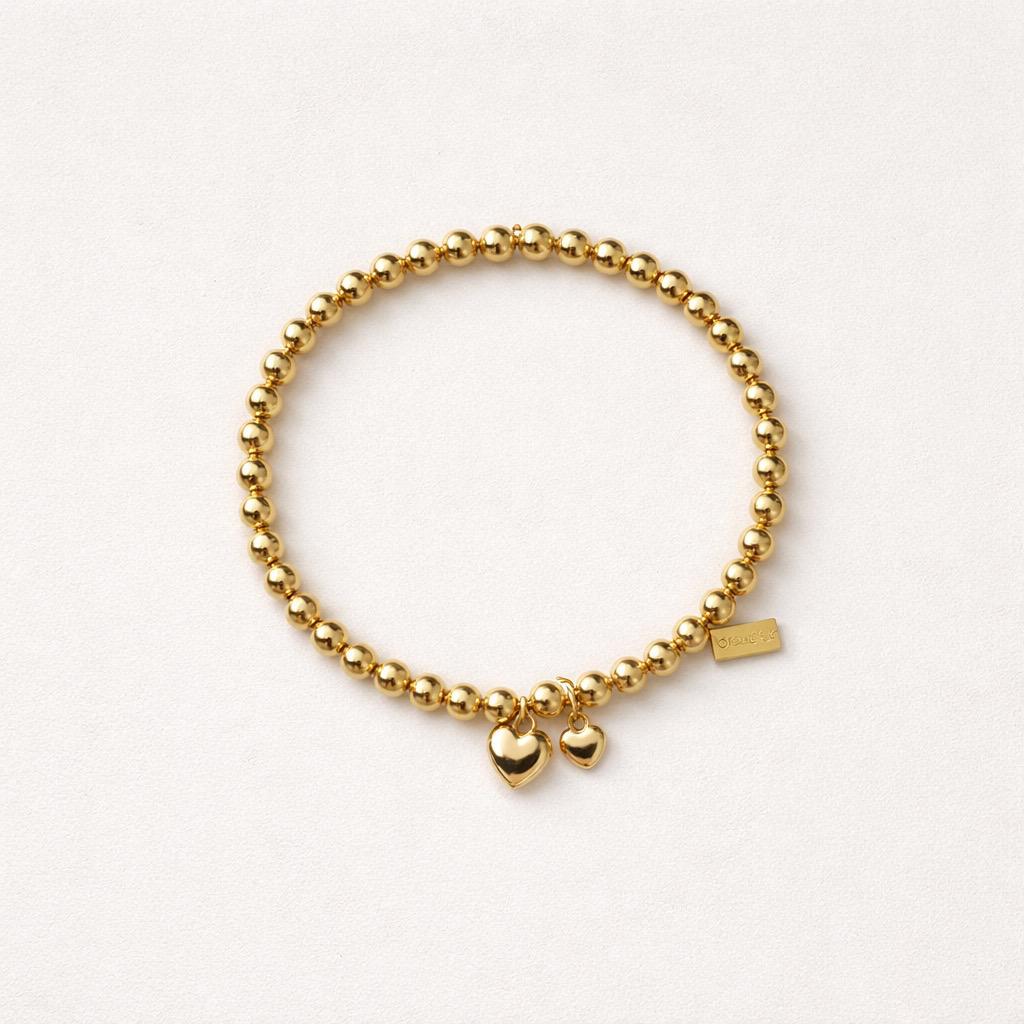Bracciale elastico in acciaio inox con cuoricini