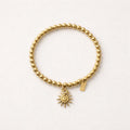 Bracciale elastico acciaio inox con sole pendente
