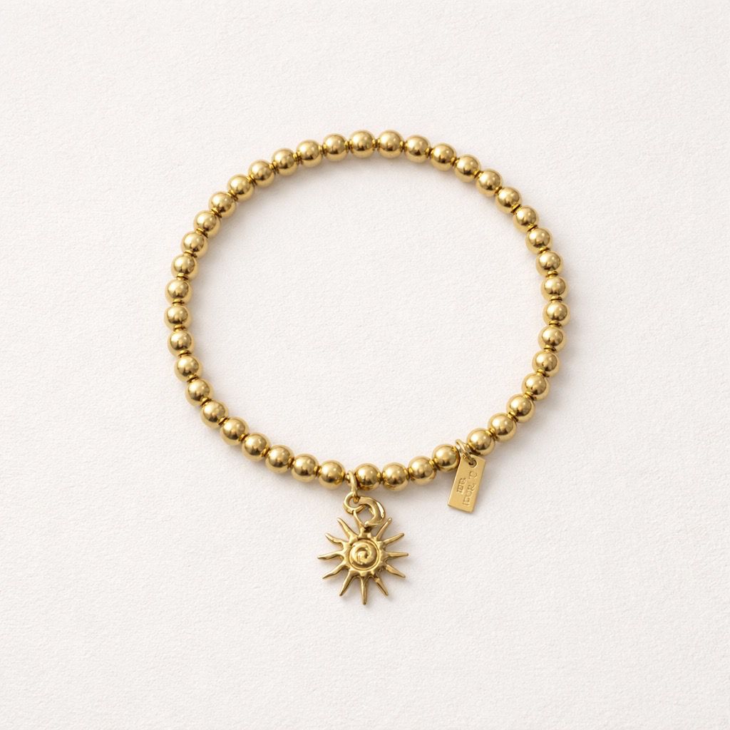 Bracciale elastico acciaio inox con sole pendente