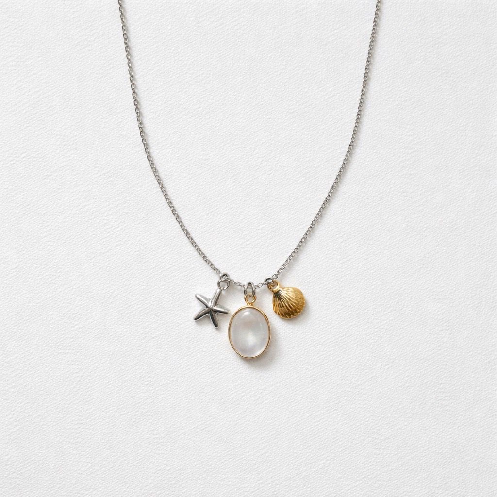 Collana in acciaio inox con charms marini