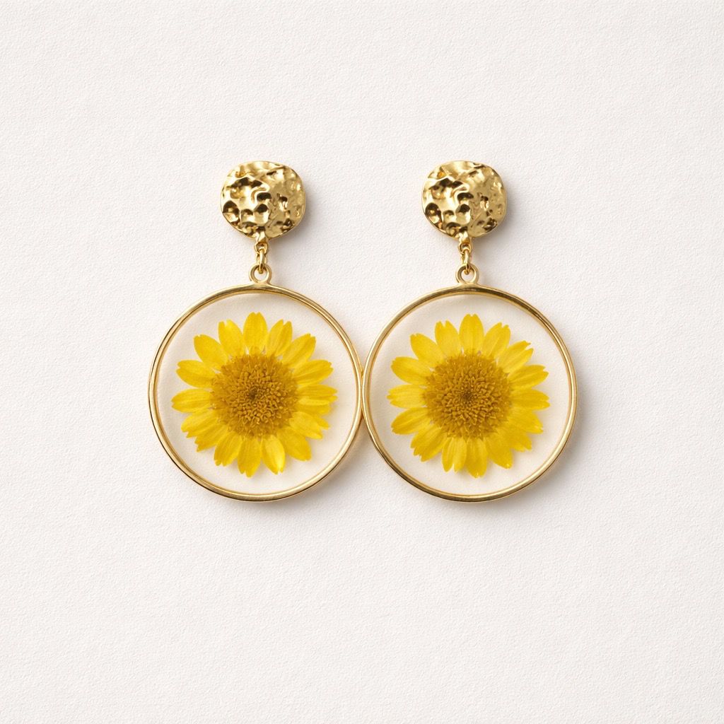 Orecchini in acciaio inox con fiore giallo secco