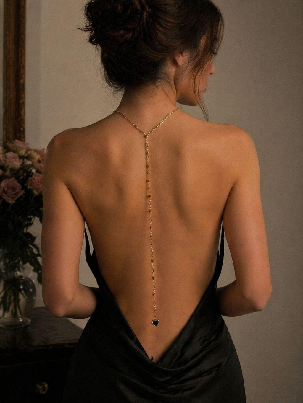 Collana lunga acciaio cuoricini da schiena